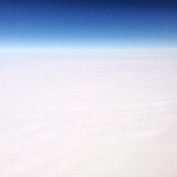 As Mike puts it, "This may look like a typical airplane view of the clouds, but it is actually a clear, cloudless day in Greenland."